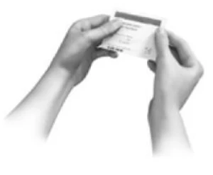 A person writing on a piece of paper

Description automatically generated with medium confidence