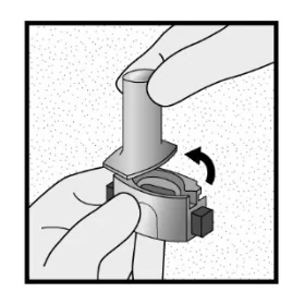 A close-up of a hand holding a metal object

Description automatically generated 