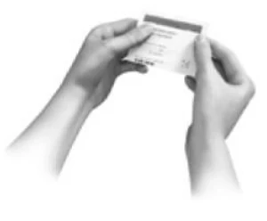 A person writing on a piece of paper

Description automatically generated with medium confidence