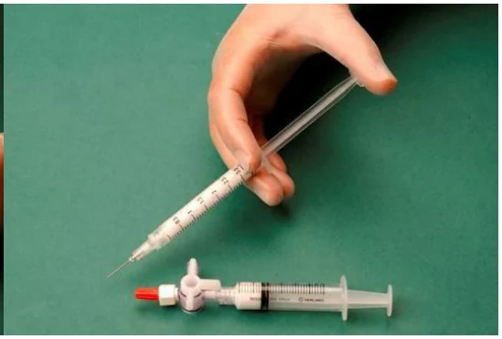 A picture containing needle, device
Description automatically generated