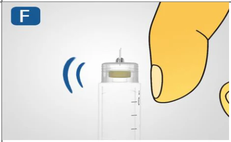 A syringe being held by a finger

Description automatically generated