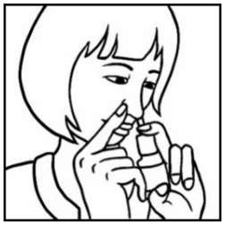 A person using a spray
AI-generated content may be incorrect.