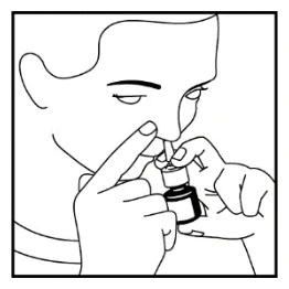 A black and white drawing of a person using a small bottle

Description automatically generated 