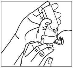 A close-up of a hand applying eye drops
Description automatically generated (Rectangle)