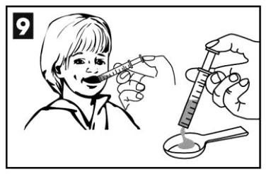 A child with a syringe in his mouth
Description automatically generated