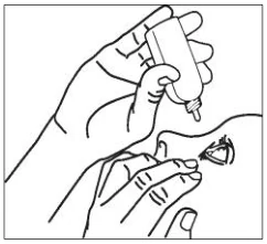 A close-up of a hand applying eye drops
Description automatically generated (Rectangle)