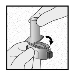 A close-up of a hand holding a piece of metal

Description automatically generated 