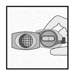 A close-up of a hand holding a device

Description automatically generated 