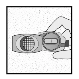 A close-up of a hand holding a device

Description automatically generated 